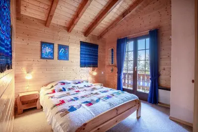 Ein Bett oder Betten in einem Zimmer der Unterkunft Chalet Hibou MOUNTAIN & QUIET chalet 6 pers