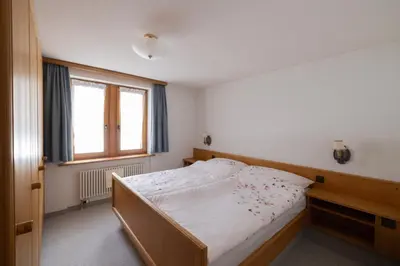 Ein Bett oder Betten in einem Zimmer der Unterkunft Quiet corner with charm in Obergesteln