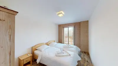 Ein Bett oder Betten in einem Zimmer der Unterkunft Les Mayens MB 010 - LUXURY apartment 8 pers
