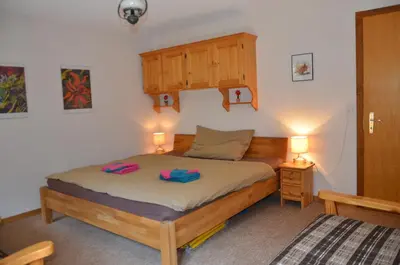 Ein Bett oder Betten in einem Zimmer der Unterkunft Immeuble Panorama