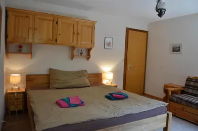Ein Bett oder Betten in einem Zimmer der Unterkunft Immeuble Panorama