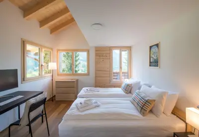 Ein Bett oder Betten in einem Zimmer der Unterkunft Chalet Rubi