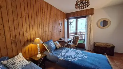 Ein Bett oder Betten in einem Zimmer der Unterkunft Viva Crans-Montana, rapport qualité prix imbattable