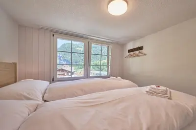 Ein Bett oder Betten in einem Zimmer der Unterkunft Lauterbrunnen Central 1