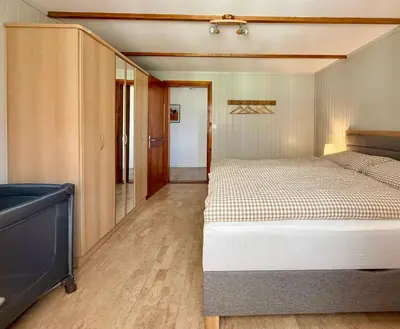 Ein Bett oder Betten in einem Zimmer der Unterkunft Fewo 'Alpegärtli' BeO Apartments