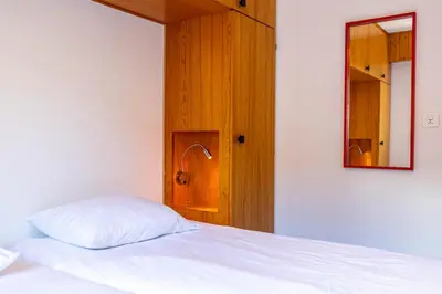 Ein Bett oder Betten in einem Zimmer der Unterkunft Combyre C 035 - COMFORTABLE apartment 6 pers