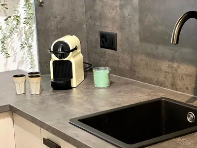 Küche/Küchenzeile in der Unterkunft Ambiente Appartement C2 - moderne Ferienwohnung mit Terrasse in Leukerbad
