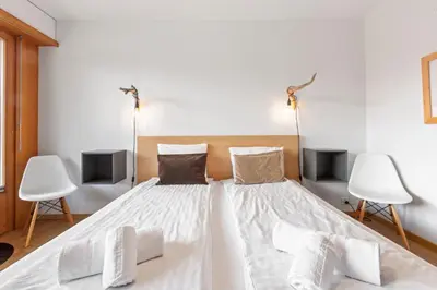 Ein Bett oder Betten in einem Zimmer der Unterkunft Appartement avec terrasse, proche du centre