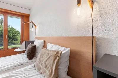 Ein Bett oder Betten in einem Zimmer der Unterkunft Appartement avec terrasse, proche du centre