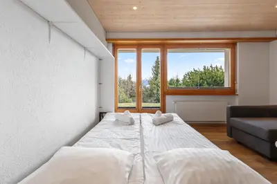 Ein Bett oder Betten in einem Zimmer der Unterkunft Appartement avec terrasse, proche du centre