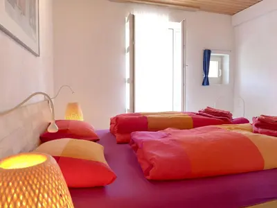 Ein Bett oder Betten in einem Zimmer der Unterkunft Apartment Wychel by Interhome