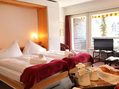 Ein Bett oder Betten in einem Zimmer der Unterkunft Apartment Matten - Utoring-26 by Interhome