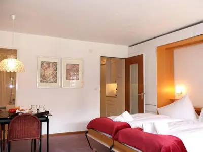 Ein Bett oder Betten in einem Zimmer der Unterkunft Apartment Matten - Utoring-26 by Interhome