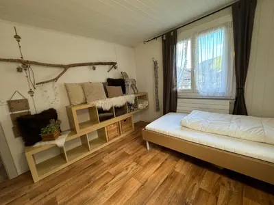 Ein Bett oder Betten in einem Zimmer der Unterkunft Nevita