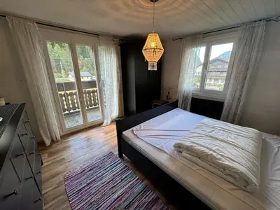 Ein Bett oder Betten in einem Zimmer der Unterkunft Nevita