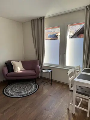 Ein Sitzbereich in der Unterkunft Red Nest