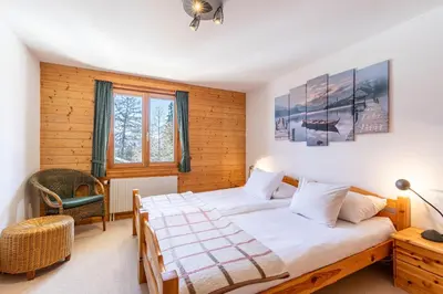Ein Bett oder Betten in einem Zimmer der Unterkunft Esperanza SKI IN & SKI OUT chalet 8 pers