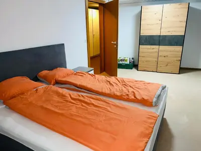 Ein Bett oder Betten in einem Zimmer der Unterkunft Haus Simplon