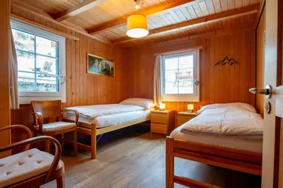 Ein Bett oder Betten in einem Zimmer der Unterkunft Ferienhaus Gäbi - Ferienwohnungen