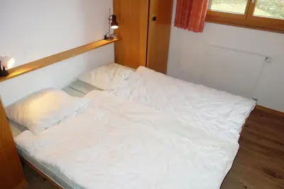 Ein Bett oder Betten in einem Zimmer der Unterkunft Gentianes G 023 - COSY apartment 6 pers