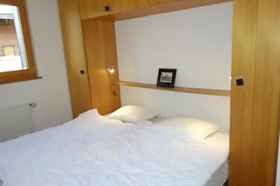 Ein Bett oder Betten in einem Zimmer der Unterkunft Gentianes G 010 - COSY apartment 8 pers