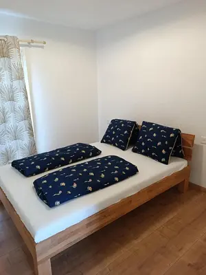Ein Bett oder Betten in einem Zimmer der Unterkunft Swiss Alpine view apartment