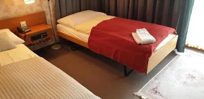 Ein Bett oder Betten in einem Zimmer der Unterkunft Bellevue-Bären