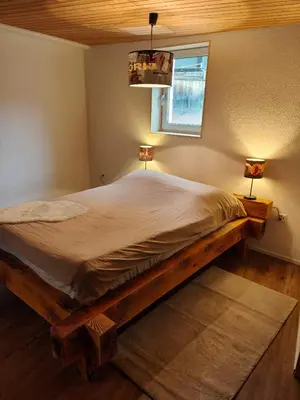 Ein Bett oder Betten in einem Zimmer der Unterkunft Frutigen Charm - two bedrooms