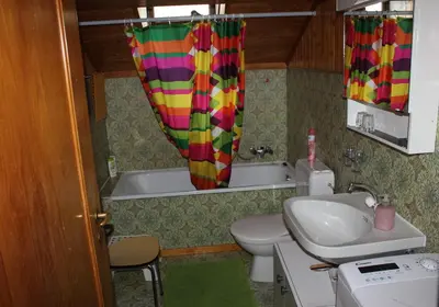 Ein Badezimmer in der Unterkunft Chalet Chinegga