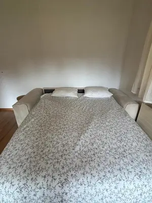 Ein Bett oder Betten in einem Zimmer der Unterkunft Grand appartement calme avec vue, balcon et parking couvert