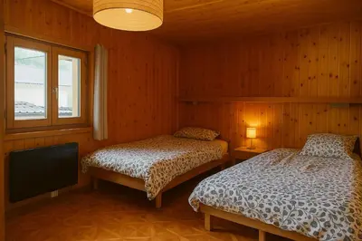 Ein Bett oder Betten in einem Zimmer der Unterkunft Le chemin des étoiles