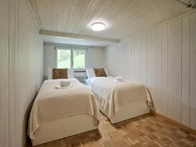 Ein Bett oder Betten in einem Zimmer der Unterkunft Chalet Mountain Love, spectacular views, spacious & luxurious