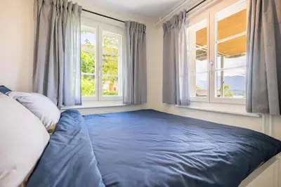 Ein Bett oder Betten in einem Zimmer der Unterkunft Chalet Gaertli
