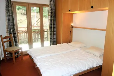 Ein Bett oder Betten in einem Zimmer der Unterkunft Melezes S 033 - SKI LIFT apartment 8 pers
