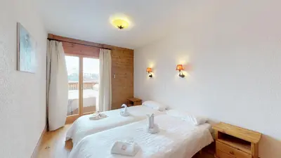 Ein Bett oder Betten in einem Zimmer der Unterkunft Hauts de Veysonnaz HV1 002 - SAUNA apartment 6 per