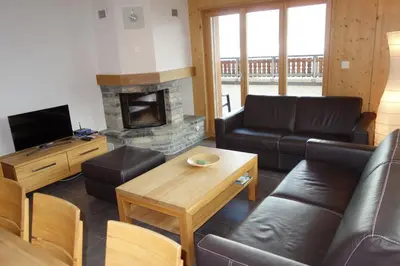 Ein Sitzbereich in der Unterkunft Hauts de Veysonnaz HV2 001 - SAUNA apartment 8 per