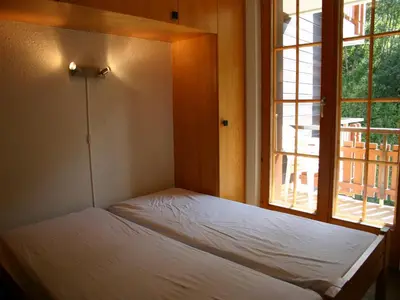 Ein Bett oder Betten in einem Zimmer der Unterkunft Alluring apartment in Les Agettes