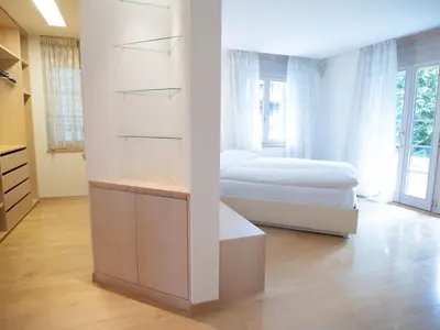 Ein Bett oder Betten in einem Zimmer der Unterkunft Orion - Garten Apartement