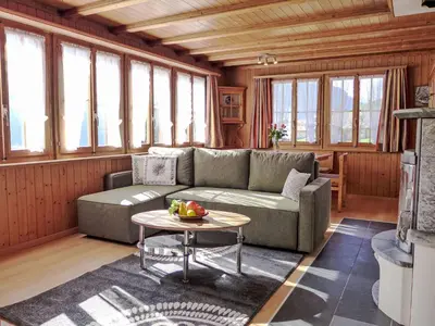 Ein Sitzbereich in der Unterkunft Holiday Home Chalet Träumli by Interhome