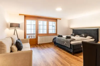 Ein Bett oder Betten in einem Zimmer der Unterkunft Studio Mira, Zermatt