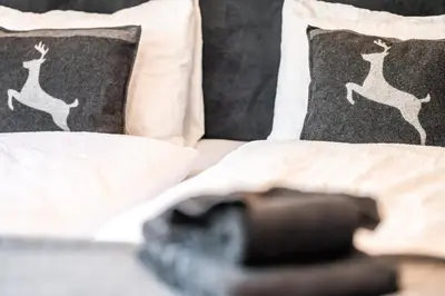 Ein Bett oder Betten in einem Zimmer der Unterkunft Studio Nova, Zermatt