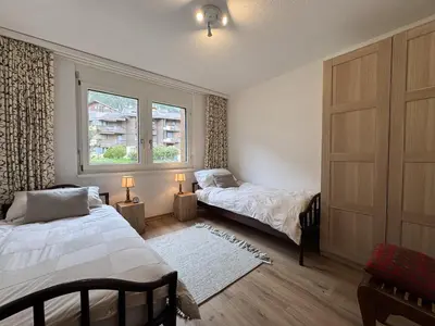 Ein Bett oder Betten in einem Zimmer der Unterkunft Chalet Primula 3
