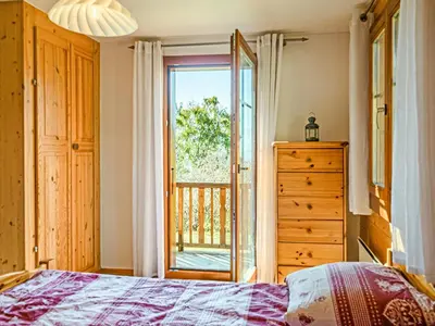 Ein Bett oder Betten in einem Zimmer der Unterkunft Chalet Marinette