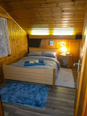 Ein Bett oder Betten in einem Zimmer der Unterkunft Duplex Salgesch