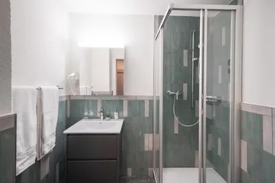 Ein Badezimmer in der Unterkunft BetweenLakes Apartment 1st floor