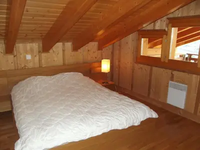 Ein Bett oder Betten in einem Zimmer der Unterkunft Tschoueilles 013 MOUNTAIN & VIEW - chalet 12 pers
