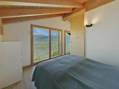 Ein Bett oder Betten in einem Zimmer der Unterkunft Chalet Teddy - Alpine Escape in the Swiss Alps