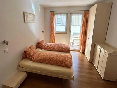 Ein Bett oder Betten in einem Zimmer der Unterkunft Älpi Retreat by Saas Grund