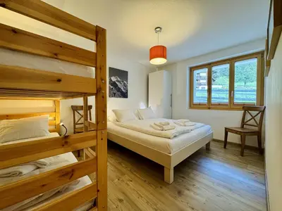 Ein Bett oder Betten in einem Zimmer der Unterkunft Stella Alpina 1