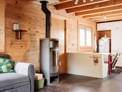 Ein Sitzbereich in der Unterkunft Chalet mit Sauna an der Piste